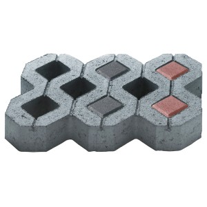 Pavé de remplissage rouge en béton pour dalles alvéolées, pour le marquage des places de parking. Pavé avec ouvertures.