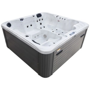 Spa extérieur Sonnenkönig Borneo White, bain à remous fixe pour 4 personnes avec extérieur gris.