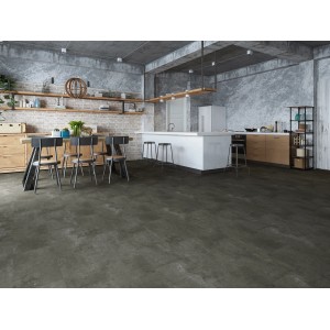 Verlegter Decoflooring Vinylboden Olbia in dunkler Steinoptik im modernen Wohnraum.