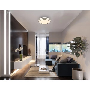Plafonnier LED rond et moderne Logan en blanc mat, installé dans un salon.
