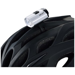 Lampe vélo LED Infini Tron I-281P, aluminium noir, fixée sur un casque de vélo.
