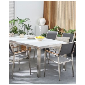 Set di sedie da giardino Beliani Grosseto, 6 sedie grigie in acciaio inox con tavolo su patio.
