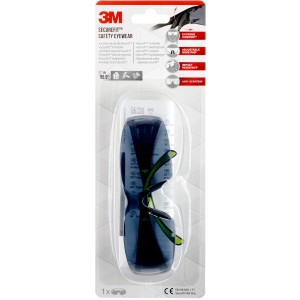 Lunettes de protection 3M SecureFit 400 avec verres teintés et branches vertes dans l'emballage.