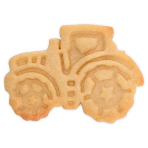 Ausgestochener Traktor-Keks, detailreich verziert, ideal für kleine Bäcker.