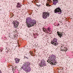 Glitzerkleber mit Konfetti-Herzen in Rot und Pink für kreative Bastelprojekte.