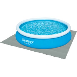 Piscine bleue sur un ensemble de dalles de protection de sol Flowclear grises (9 pièces, 50x50 cm) pour piscines hors sol.