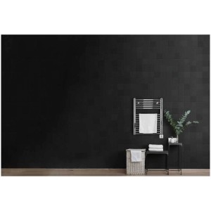 Radiateur sèche-serviettes Sonnenkönig Nika 1 dans salle de bain avec serviettes.