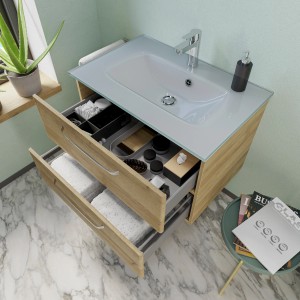 Meuble sous-vasque Pelipal Trentino Riviera chêne, 75 cm de large, avec deux tiroirs ouverts.