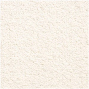 Moquette crème Samar avec envers en feutre, vendue au mètre. Gros plan sur la texture.