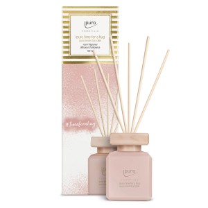 Ipuro Parfum d'ambiance Essentials Time For A Hug, 100 ml, flacon rose avec bâtonnets parfumés.