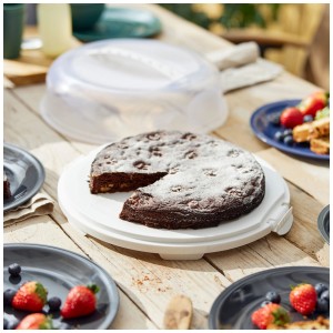 Portatorta bianco Rotho Fresh piatto con torta al cioccolato, ideale per la conservazione degli alimenti.