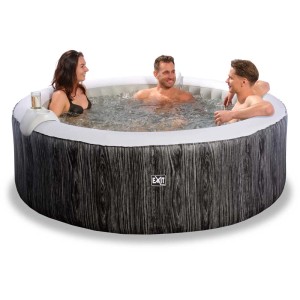 Bain à remous Exit avec des personnes, un appui-tête et un porte-boissons pour des heures de détente dans le jardin.