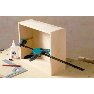 Serre-joint à une main Wolfcraft EHZ Easy 75-500 fixant une pièce.