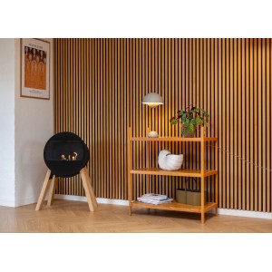 Poêle à bioéthanol Aduro B2, cheminée décorative ronde en acier avec pieds en bois dans le salon.