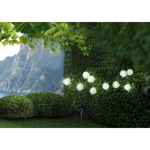 Catena luminosa solare a LED Globo con 10 lanterne bianche in plastica in giardino.