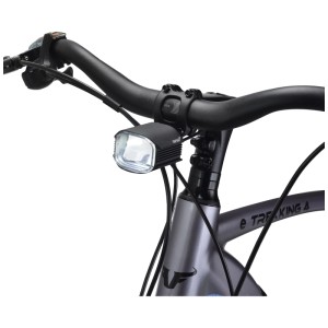 Éclairage avant pour vélo électrique Infini Lux avec 6 LED, boîtier en aluminium, monté sur le guidon du vélo.