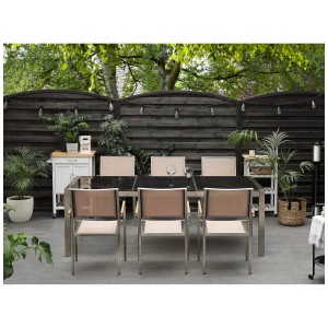 Beliani Gartentisch Grosseto mit polierter Granitplatte und Edelstahlrahmen, geeignet für 8 Personen.