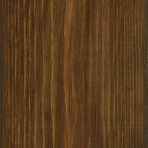 Surface en bois traitée avec la lasure d'intérieur OBI couleur noyer foncé.
