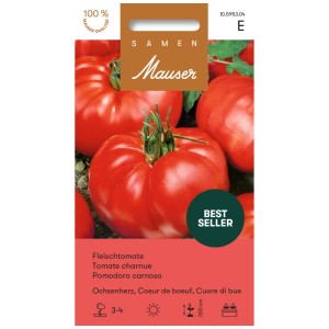 Sachet de graines de tomate charnue 'Coeur de boeuf', avec des tomates rouges côtelées en arrière-plan.
