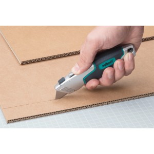 Mano taglia cartone con coltello a doppia lama wolfcraft Profi. Lama trapezoidale visibile.