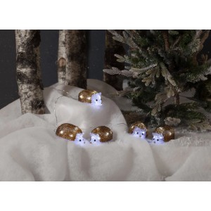 Catena luminosa con 5 ricci marroni scintillanti e LED bianchi freddi su neve artificiale. Decorazione esterna.