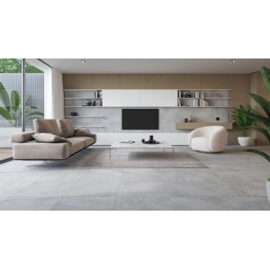 Gres porcellanato grigio Moonrow posato in un moderno soggiorno. Piastrella per pavimento opaca 59,8x59,8 cm.
