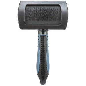 Brosse douce Trixie en plastique, 10x17 cm, pour un entretien doux du pelage des chiens.