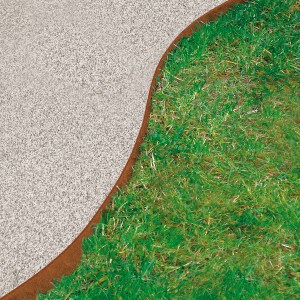 Bordure de pelouse Bellissa en acier Corten, 118x20cm, séparant pelouse et gravier.