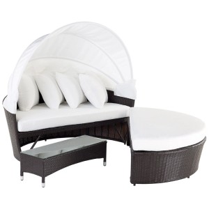 Isola prendisole Sylt Lux grigia con baldacchino, sgabello e tavolo. Lettino relax in polyrattan e cuscini bianchi.