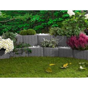 Pietre da piantare Kann Mini Plus grigie come muro di giardino decorativo e piantumato.