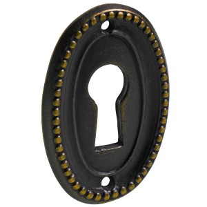 Hettich bocchetta per chiave, finitura anticata brunita, design ovale con bordo decorativo per serrature mobili.