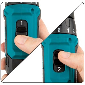 Gros plan : Visseuse-perceuse sans fil Makita DF333DSYJ avec interrupteur en position 1 et 2.