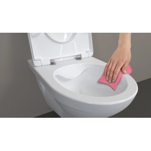 Laufen WC-Set Moderna R senza brida, sospeso, con sedile WC in fase di pulizia.