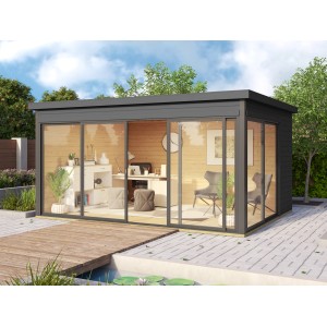 Moderna casetta da giardino in legno grigio grafite con tetto piatto e ampie vetrate, arredata come ufficio.