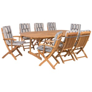 Ensemble jardin Beliani Maui: table ovale extensible en acacia, 8 chaises pliantes avec accoudoirs et coussins bleu-beige.