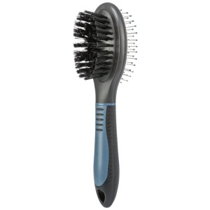 Brosse pour chien Trixie double face avec poils et picots pour le soin du pelage.