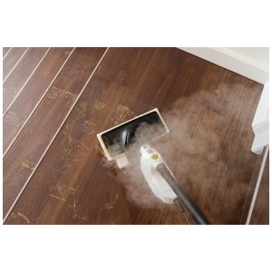 Nettoyeur vapeur Kärcher SC 1 Multi & Up en action sur parquet, élimine la saleté à la vapeur.