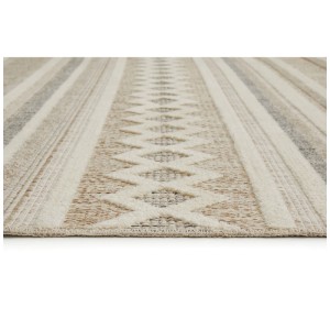 Gros plan du tapis tissé crème et gris Luxor Living Crosby avec motif géométrique.