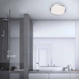 Plafonnier LED Briloner Acorus, Ø 33cm, chrome, avec effet ciel étoilé dans une salle de bain.