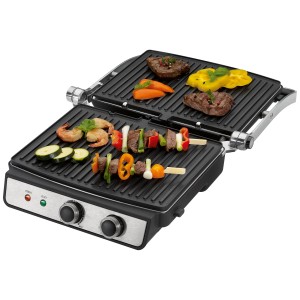 Griglia a contatto KG1264 con bistecche, verdure e spiedini su piastre. Grill elettrico con corpo in acciaio inox.