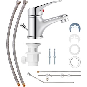 Mitigeur de lavabo monotrou Foglia chromé avec accessoires tels que flexibles de raccordement et garniture de vidage.