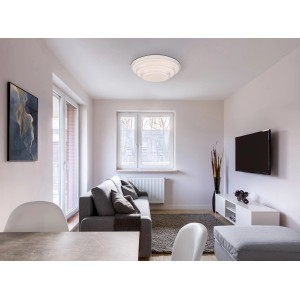 Plafonnier LED blanc Globo Magnifique, Ø 49,5 cm, dans salon avec canapé et TV.