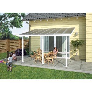 Copertura per patio Palram Canopia Feria bianca 3x4.25 con area salotto in giardino.