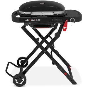 Grill a gas Weber Traveler Compact mini nero con telaio pieghevole e tavolino laterale.