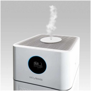 Purificatore d'aria Alpha bianco con display e vapore in uscita.