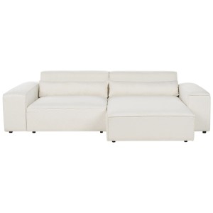 Canapé d'angle blanc Beliani Hellnar en tissu bouclé, 176x262cm. Moderne sofa avec méridienne et coussins.