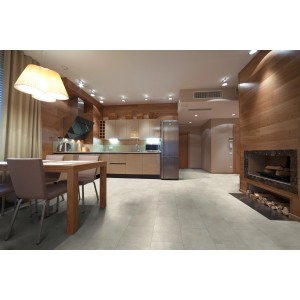 Pièce lumineuse avec des carreaux aspect pierre Classen Ceramin Neo Vario Venus comme revêtement de sol.