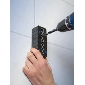 Gabarit de perçage LUX utilisé avec une perceuse pour des trous précis de 4 mm à 12 mm.