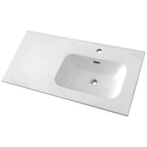 Lavabo in ceramica bianca lucida con vasca a destra, foro per rubinetto e troppopieno.