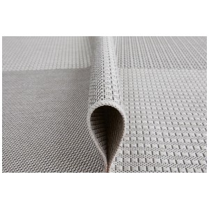 Tappeto Andiamo Arizona grigio-antracite, dettaglio della texture e dell'estremità arrotolata.
